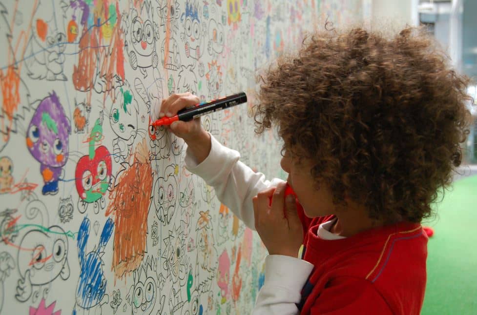 Child writing on a wall